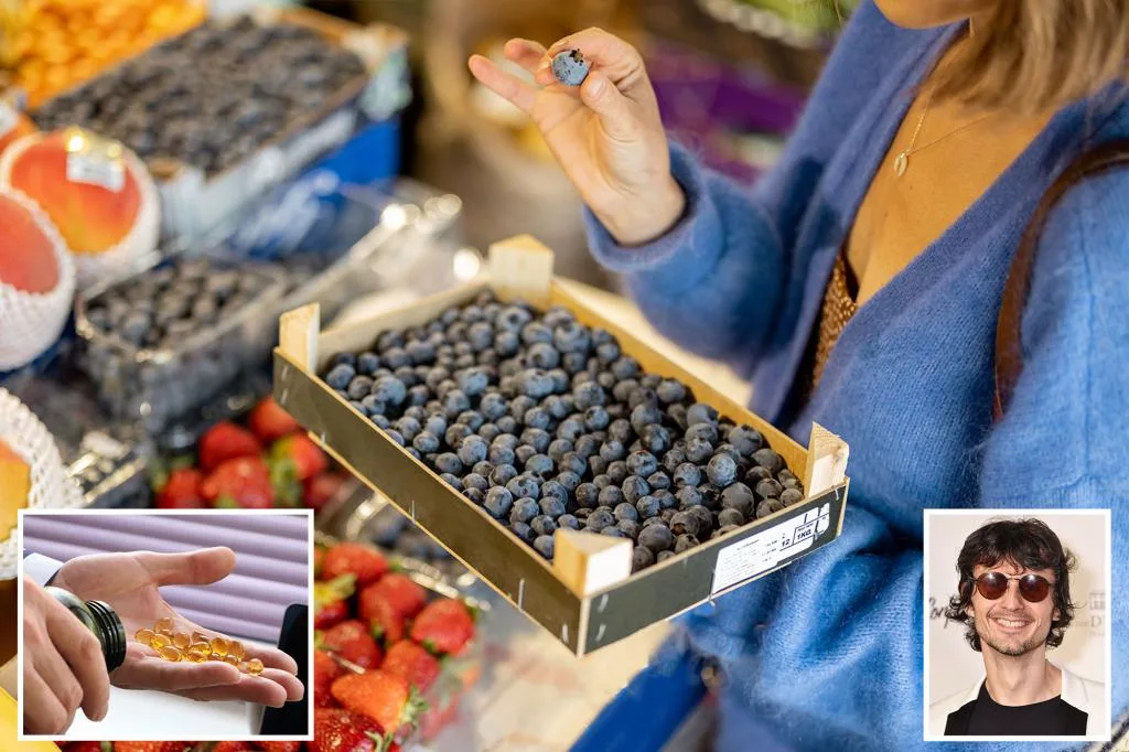 woman holds box full blueberries 80955027 jpg